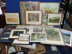 A box of pictures including a framed tapestry,