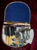 A large wooden box containing stainless steel bone handled cutlery (box a/f)