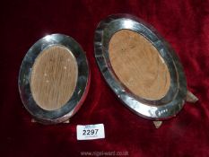 Two oval silver photo frames one with extensive denting, Birmingham 1914 to maker H.P &Co.