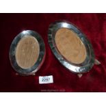 Two oval silver photo frames one with extensive denting, Birmingham 1914 to maker H.P &Co.