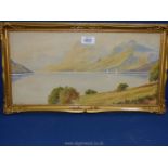 An ornate framed watercolour, titled lower right 'Derwent water', signed lower left L.