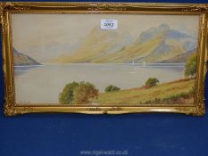 An ornate framed watercolour, titled lower right 'Derwent water', signed lower left L.