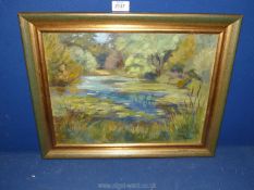 Audrey Thornton: signed oil on canvas of an Impressionist landscape with Lily pond, circa 1950,