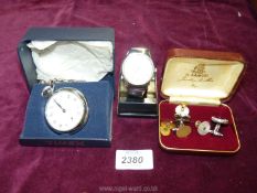 A boxed Timex fob watch having silver graduated chain and another watch,