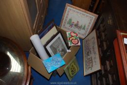 A box of pictures, tapestries, etc.