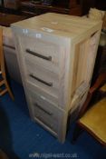 A pair of two drawer oak grain bedside cabinets.