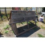 A large wooden chicken run with nest box above, in need of attention, 85" x 43".