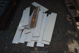 A quantity of 6" x 1" white shelving softwood.