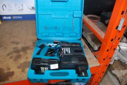 A Makita rechargeable drill in a case with two batteries.