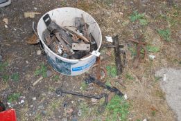 A bucket of metal and iron door and gate latches, etc.