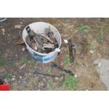 A bucket of metal and iron door and gate latches, etc.