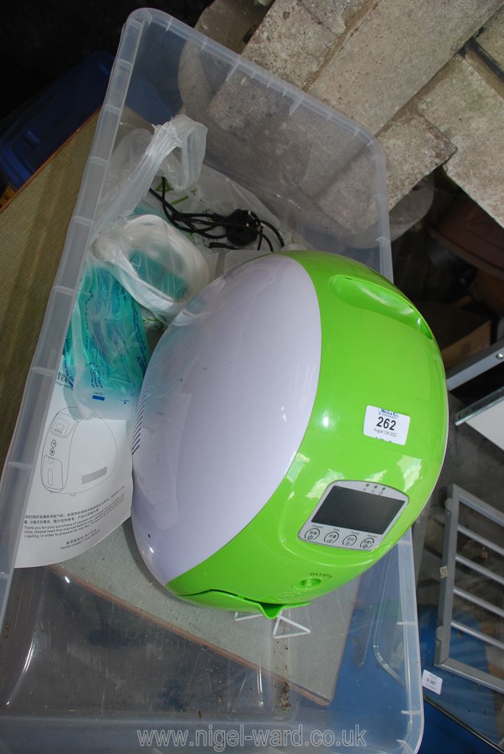 A home oxygen machine (running at time of lotting).