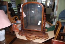 A Victorian Mahogany swing dressing table mirror, with shaped base,
