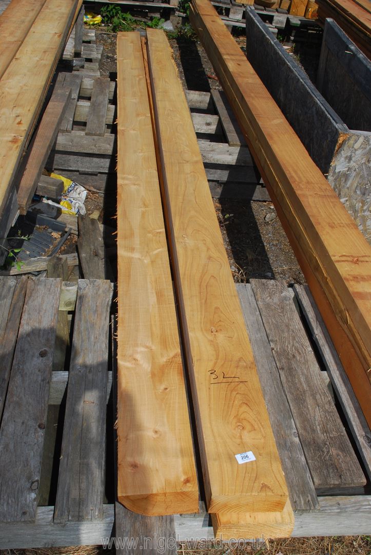 Three lengths of cedar, some rough cut 6" x 2"x 142" long.