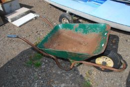A large metal builders wheelbarrow with pneumatic tyre (a/f).