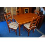 A kitchen table, 31" x 48" x 30" highmand set of four dining chairs.
