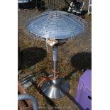 A gas powered table size patio heater 36" tall.