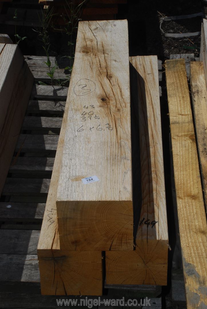 Three pieces of 6" x 6 3/4" oak timber 39", 40" and 43" long.