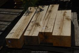 Four pieces of Oak timber, two being 8 1/2" x 7" x 43 1/2" x 44" long,