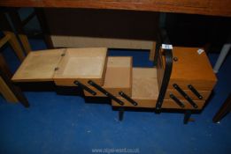 A cantilever sewing box.