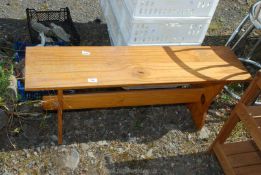 A solid pine kitchen bench.