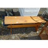 A solid pine kitchen bench.