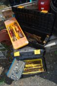 Two plastic tool boxes containing socket sets, saw, etc.