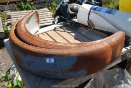 Three metal trailer mud guards.