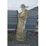 A concrete figure of a woman with dove, 34" tall.
