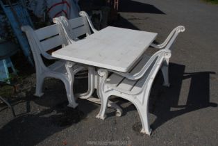 A good quality heavy duty garden table, bench and two chairs, table 59" x 32" x 27",
