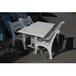 A good quality heavy duty garden table, bench and two chairs, table 59" x 32" x 27",