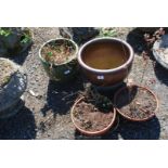 Two glazed planters, green 11" tall, brown 12" tall x 15" diameter and two terracotta bulb pots.