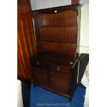 A small Stag Mahogany dresser, 38" wide x 67'' high x 17" deep.