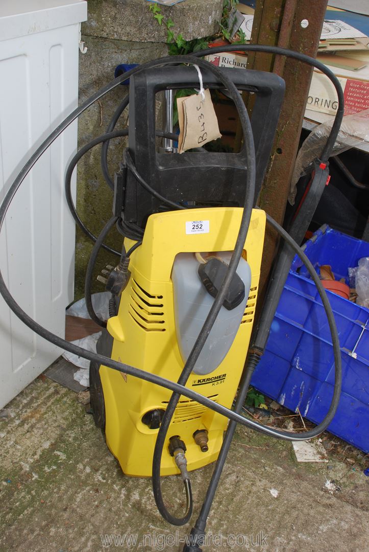 A K'archer pressure washer, motor runs (unable to test due to water.