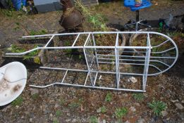 White metal bathroom racking to fit over cistern.