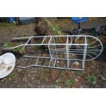 White metal bathroom racking to fit over cistern.