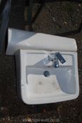 A hand wash basin, mixer and pedestal, basin 22" x 17 1/2", pedestal 28" tall.