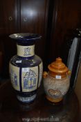 A Rumtopf with lid and a large baluster vase in blue & cream.