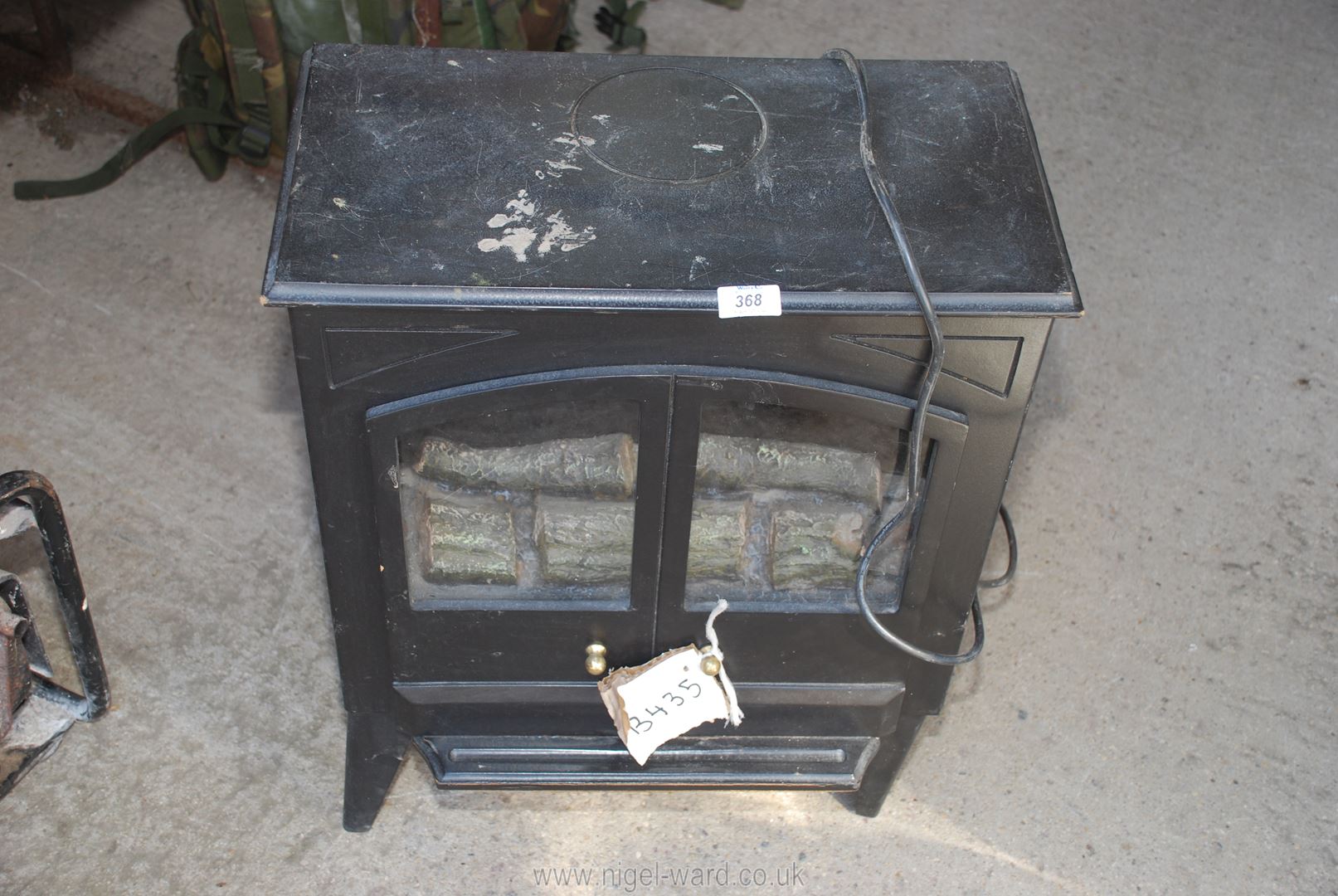An electric log effect stove a/f.