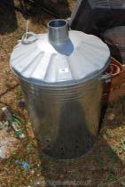 A new metal garden brazier/incinerator with a chimney to the lid.