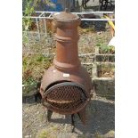 A metal garden chiminea.