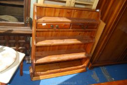 A set of pine shelving with two small drawers, 35" x 40" x 10" deep.