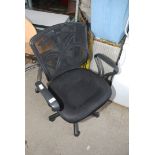 A swivel office chair.