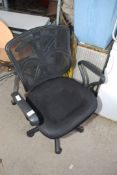 A swivel office chair.