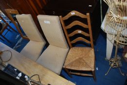 A ladderback kitchen chair with seagrass seat and two beige upholstered dining chairs.