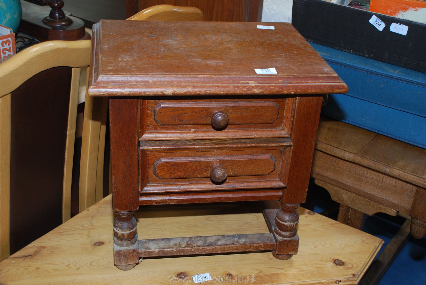 A small cabinet with two drawers, 18" x 14" x 18" high.