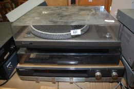 A Garrard record player and Sanyo music system a/f. Sold As Seen.