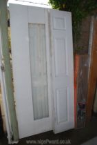 A pair of bi-fold interior doors and a part glazed interior door.