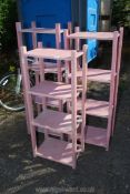 Three free standing pink shelves; 19" wide x 13" deep, two 54" high and the other 4ft high.