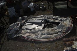 An inflatable boat/rib with wooden panel floor and back board for outboard engine a/f.